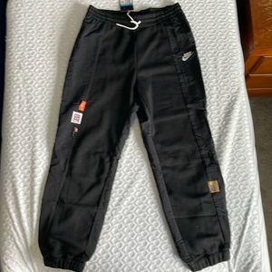 Nike Women’s sportswear track pants.  New, never worn. Black Medium - loose fit